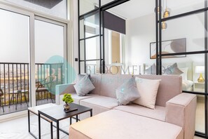 Appartement Deluxe, balcon, vue sur la ville | Aire de séjour