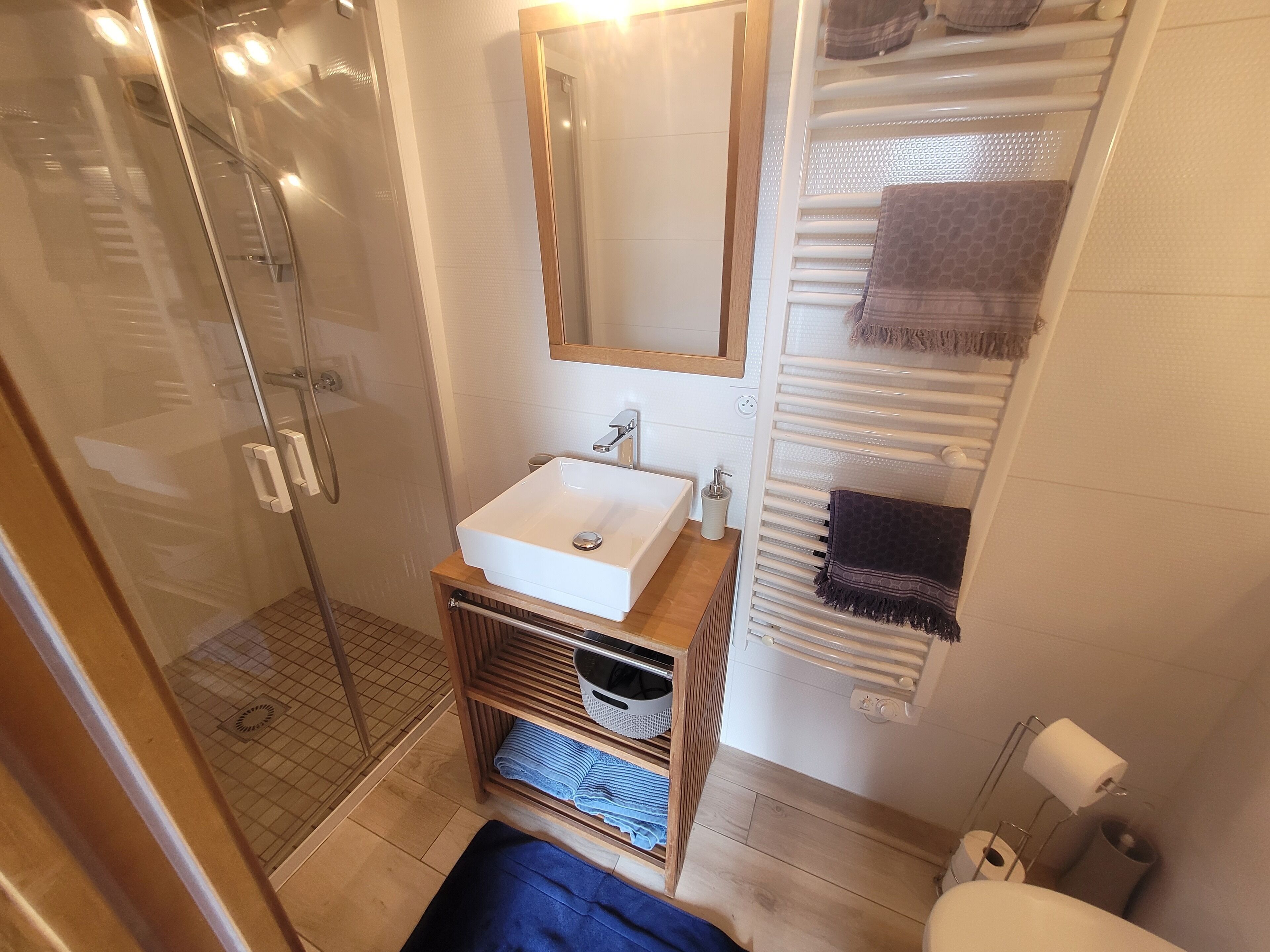 Shower, hair dryer, towels, soap