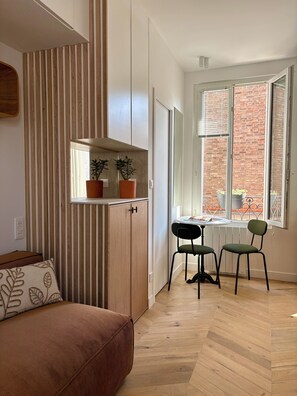 Departamento Confort, vista a la ciudad | Área de sala de estar