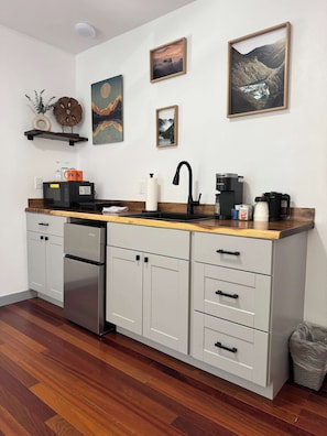 Microwave, coffee/tea maker, cookware/dishes/utensils
