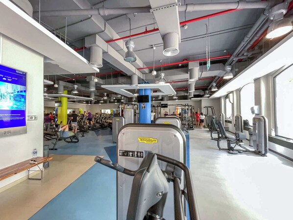 Stay fit with our fully equipped gym featuring treadmills, weight machines, and free weights.