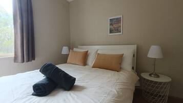 2 chambres, fer et planche à repasser, Wi-Fi, draps fournis