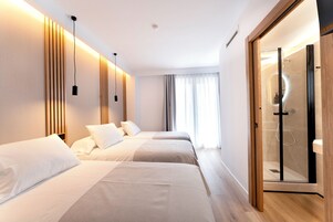 Deluxe Triple Room, City View | Desk, laptop workspace, free WiFi, wheelchair access