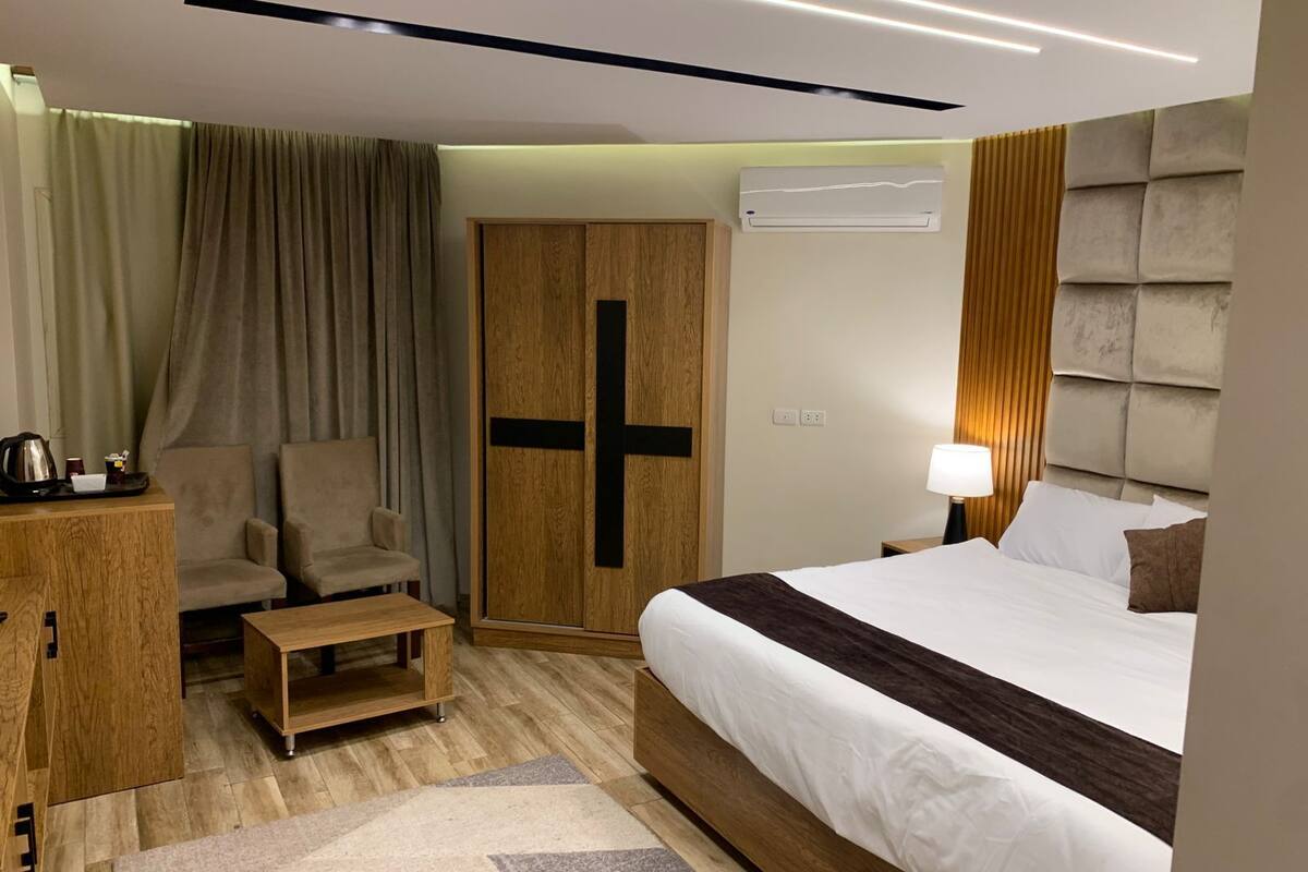 Comfort Quadruple Room, 2 Queen Beds | 1 bedroom, premium bedding, in-room safe, iron/ironing board