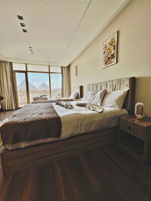 Deluxe Triple Room, Mountain View | 1 bedroom, premium bedding, in-room safe, iron/ironing board