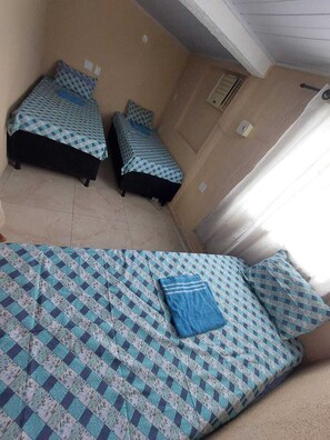 Quarto 402 para 3 amigos com ar