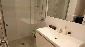 Hair dryer, towels, soap, toilet paper