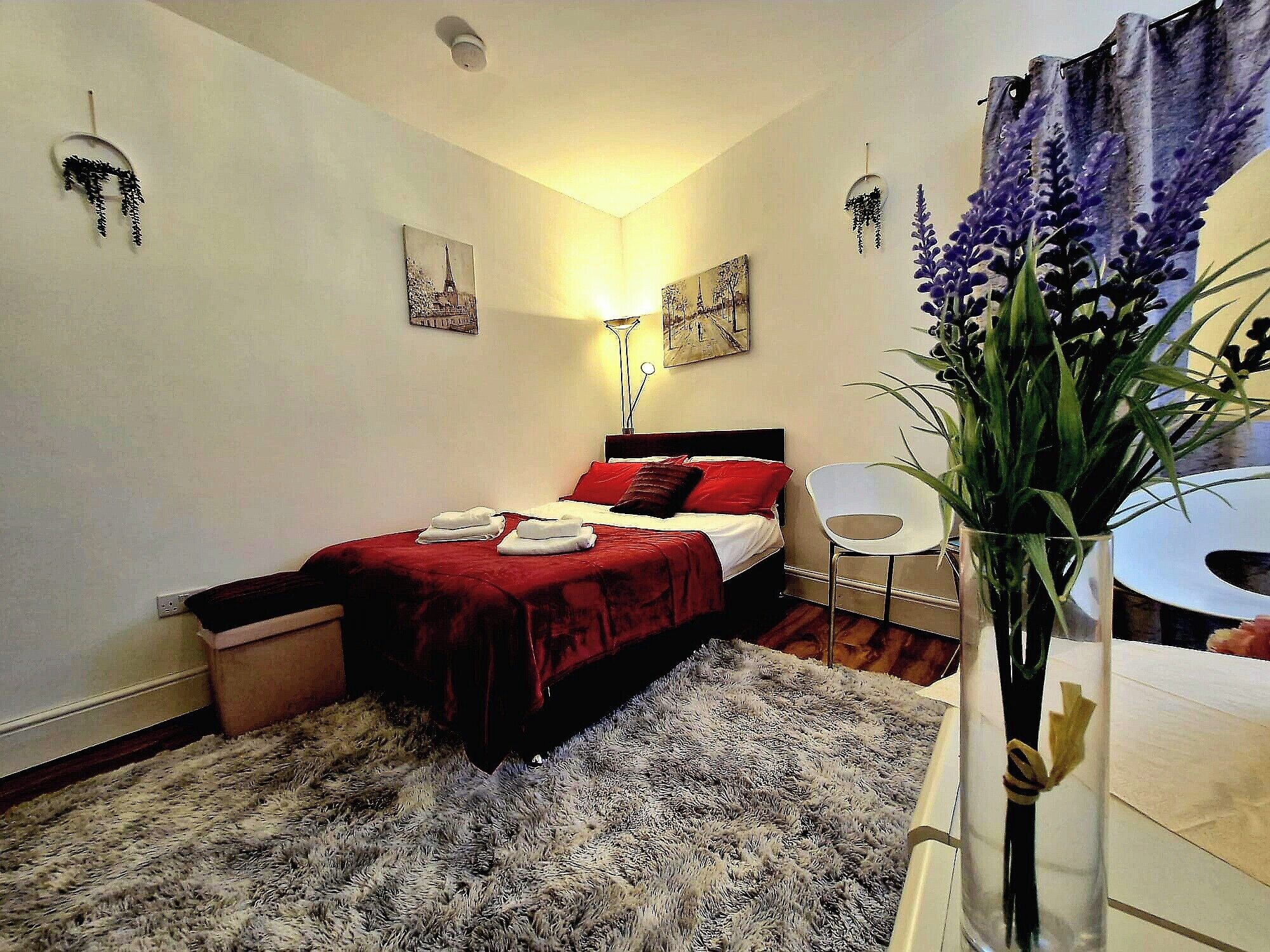 Departamento | 1 habitación, tabla de planchar con plancha, wifi gratis y ropa de cama 