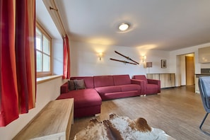 Comfort Apartment, 2 Bedrooms, Mountain View | Living area | 50-inch flat-screen TV with cable channels - Apartment Residence Top 1 (Saalbach)