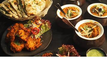 Daily buffet breakfast (INR 250 per person)