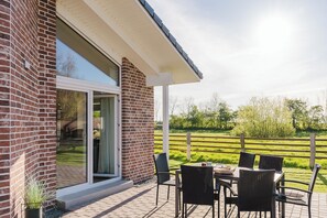 Outdoor dining - Vacation home Wiesenkiek - Farm Hopp Vadersdorf (Fehmarn)