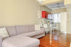 Apartment, 1 Double Bed with Sofa bed, Balcony | Living area | 43-inch Smart TV with digital channels