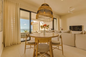 Premium Apartment, Sea View | Living area | 52-cm Smart TV with satellite channels