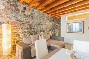 Apartment, 2 Bedrooms (2 Bedrooms) | Living area | 32-inch flat-screen TV with cable channels