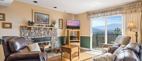 Signature Condo, 2 Bedrooms, Kitchen, Mountain View | Living room | 55-inch Smart TV with digital channels, fireplace