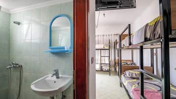 Shower, rainfall showerhead, hair dryer, towels