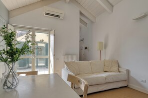 Standard Apartment, Balcony | Living area | 43-inch Smart TV with digital channels