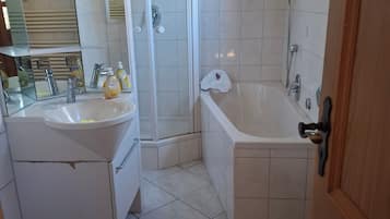 Hair dryer, towels, soap, toilet paper