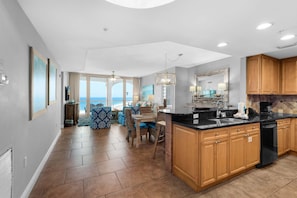 Condo, Multiple Beds (Portofino Island Resort 1-1402) | Private kitchen | Oven, toaster