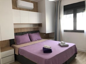 Apartemen | 1 kamar tidur, setrika/meja setrika, Wi-Fi gratis, dan seprai linen