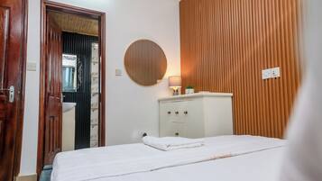 Egyptian cotton sheets, premium bedding, laptop workspace, soundproofing