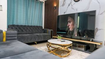 Luxury Apartment, City View | Living area