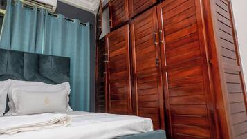 Egyptian cotton sheets, premium bedding, laptop workspace, soundproofing