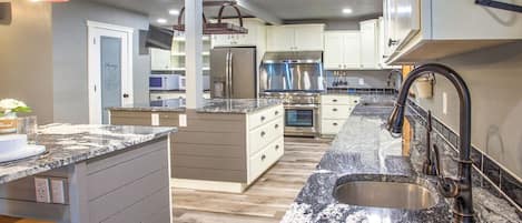 Fridge, microwave, dishwasher, coffee/tea maker