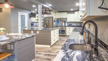 Microwave, dishwasher, toaster, dining tables