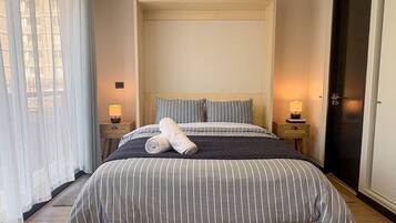 Basic Apartment | Blackout drapes, iron/ironing board, free WiFi