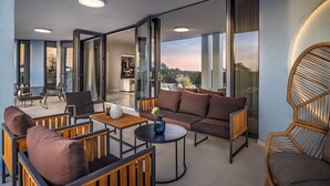 A modern outdoor living area with a sofa, chairs, and a table. - Casa Q by Istra Vacation (Sveti Petar u Šumi)