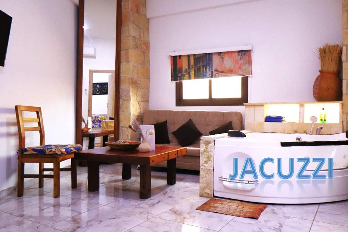 Luxury Apartment, 1 Double Bed with Sofa bed, Jetted Tub, Sea View | 1 bedroom, individually decorated, individually furnished, desk