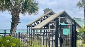 A beach pavilion entrance with a sign indicating it is for owner and guests only.