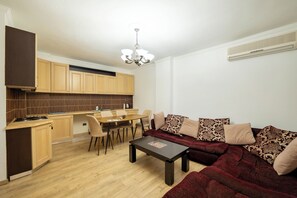 Apartment, 2 Bedrooms | Living room | 42-inch flat-screen TV with satellite channels - Tirent Apartment - Spacious 2-Bedroom Stay Near Liqeni i Thatë (Farke)