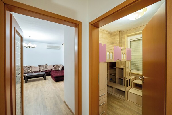 Apartment, 2 Bedrooms | Living room | 42-inch flat-screen TV with satellite channels