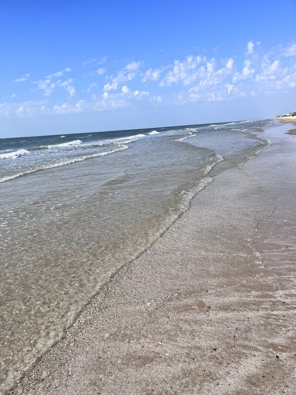 On the beach, sun loungers, beach towels