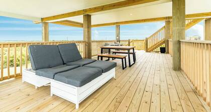 Oceanfront Serene Coastal Escape in Crystal Beach, TX: Yellow Daisy by the Sea