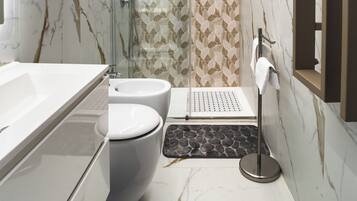 Deluxe Double Room, Balcony | Bathroom | Hair dryer, slippers, towels, soap