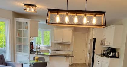 Spacious riverfront cottage in Grand Bend, ON, with stunning views and comfort!