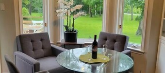 Spacious riverfront cottage in Grand Bend, ON, with stunning views and comfort!