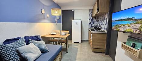 Comfort Apartment, Balcony, City View | Living area | 32-inch TV with digital channels, Netflix, smart speakers