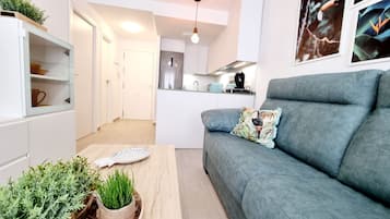 Apartment, 1 Bedroom, Balcony, Pool View | Living room
