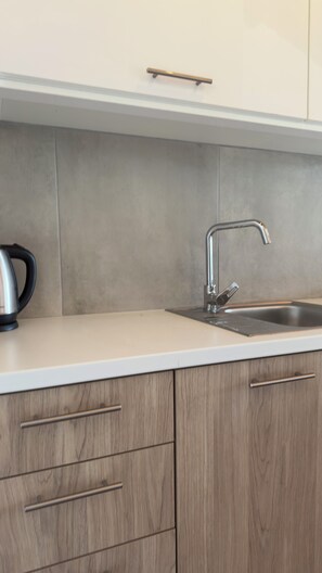 Standard Studio, 3 Twin Beds, Balcony, Sea View | Private kitchen | Fridge, stovetop, electric kettle, freezer - Olga's Sea View Studios -500m from Ipsos (Corfu)