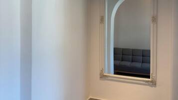 Apartamento standard, vários quartos, terraço, vista para o jardim | Área de estar