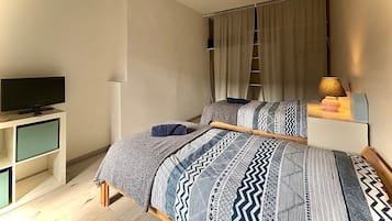 2 chambres, fer et planche à repasser, accès Internet, draps fournis