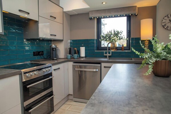 Fridge, microwave, dishwasher, coffee/tea maker