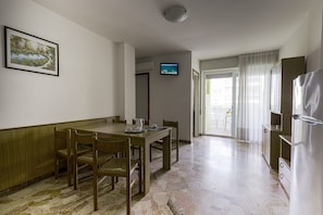 Apartment, 2 Bedrooms, Balcony | Dining room - Seaside Getaway With Terrace in Bibione (San Michele al Tagliamento)