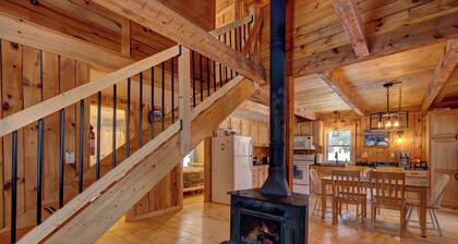 Designed for slow mornings and star-filled nights, this secluded Northeast Kingdom escape features a year-round heated hot tub and private pond.