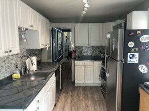 Fridge, microwave, oven, stovetop - Charming 3-bedroom house 1 miles from the beach in Neptune City. (Neptune City)