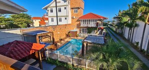 Comfort Apartment, 2 Bedrooms, Lanai, Partial Sea View | Courtyard view - Pousada Recanto Edenico LTDA (Palhoca)